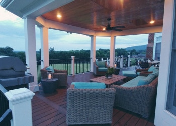 Custom deck and outdoor grilling area at dusk.
