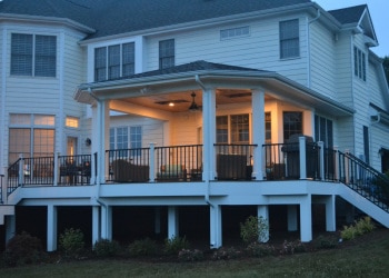 Side view of a custom deck with outdoor seating.