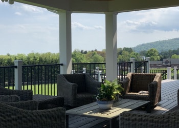Outdoor lounge seating on a covered deck.
