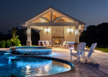 Nighttime pavilion spa and pool lighting in the Purcellville retreat