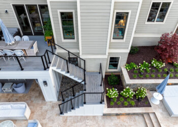 Upper terrace and landscaped stairs connecting the outdoor living spaces