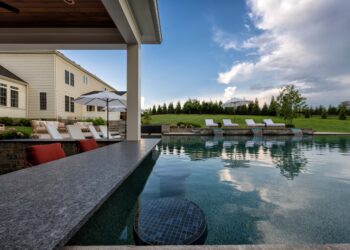Water-facing bar and pool reflections at Waterford Creek Resort