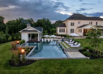 Aerial view of the pool, pavilion, and landscape at Waterford Creek Resort