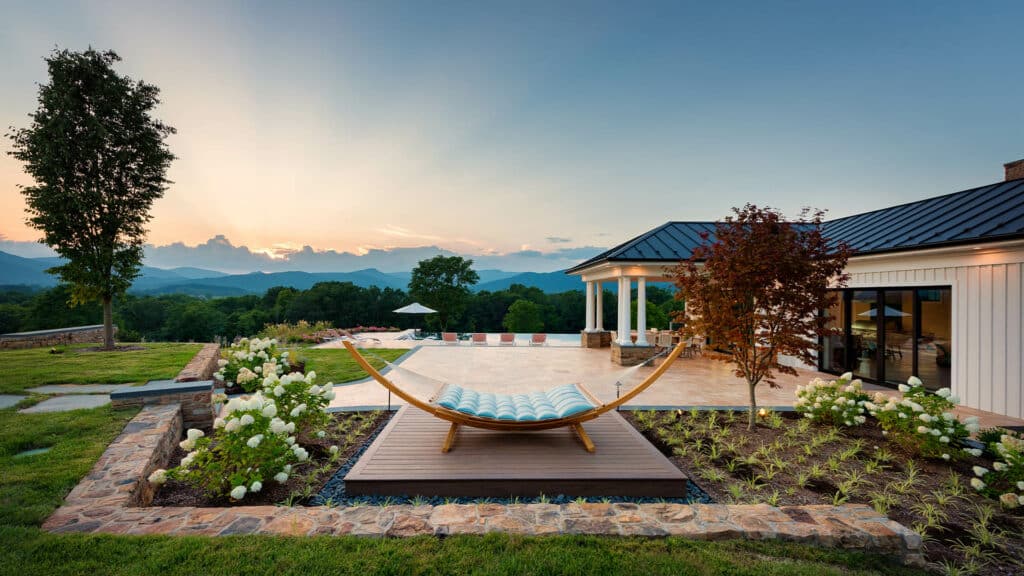 patio with hammock and pool