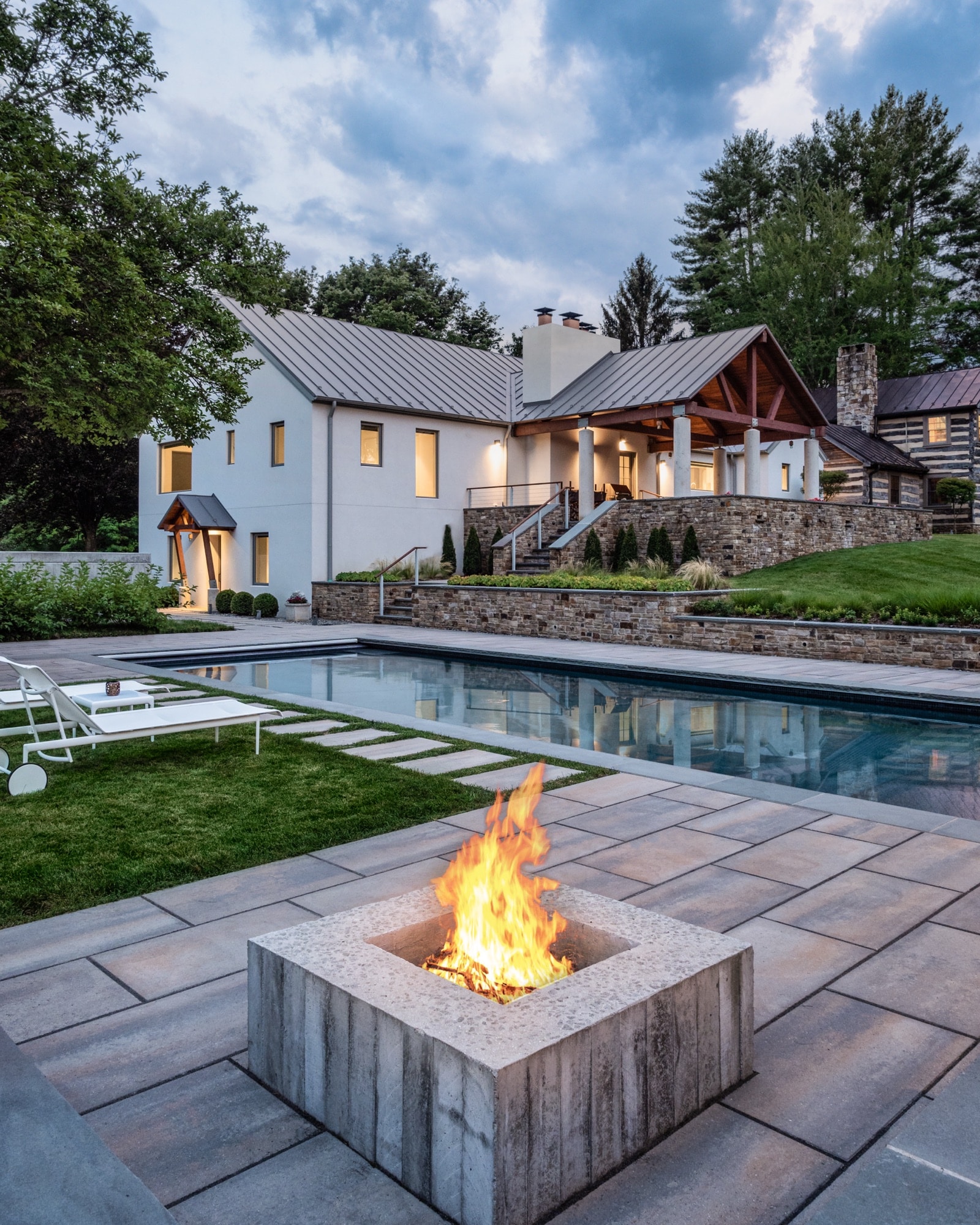 Pool and fire feature at dusk