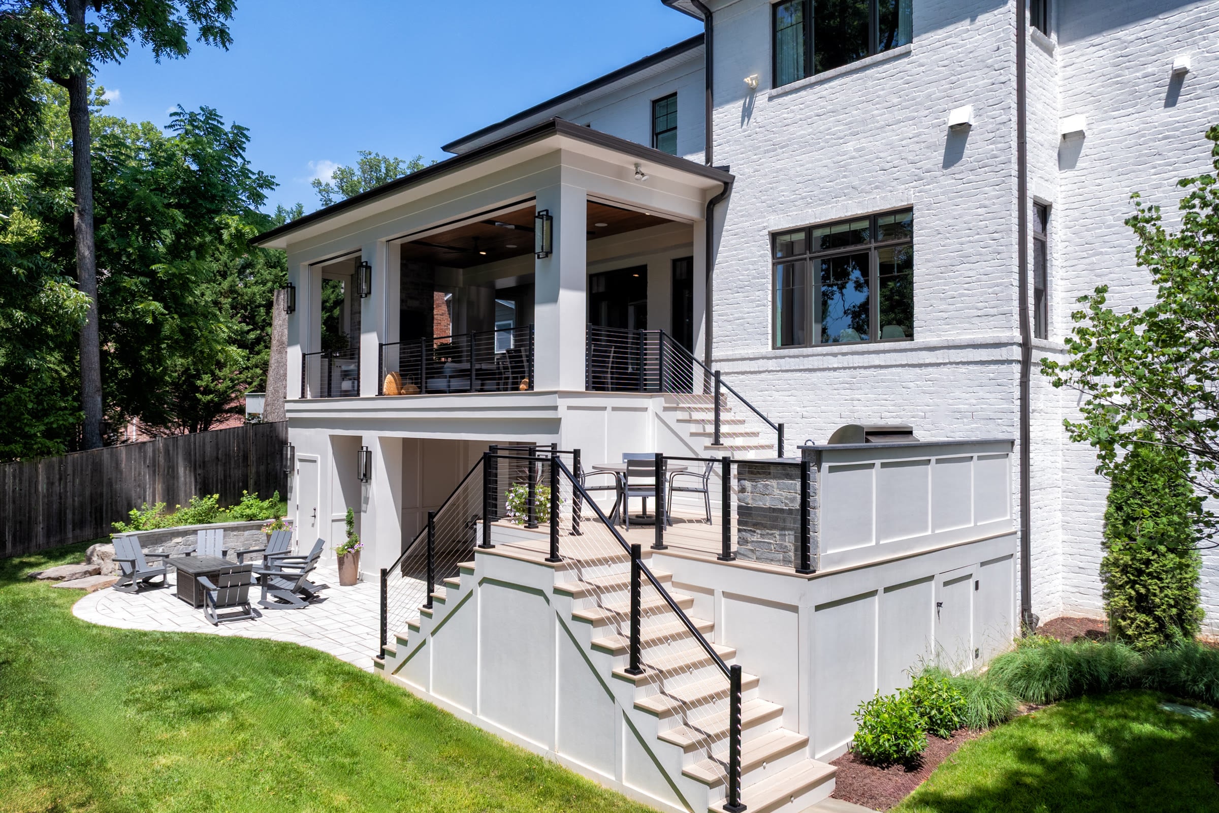 Full exterior view of the covered porch outdoor kitchen terrace and canopy retreat